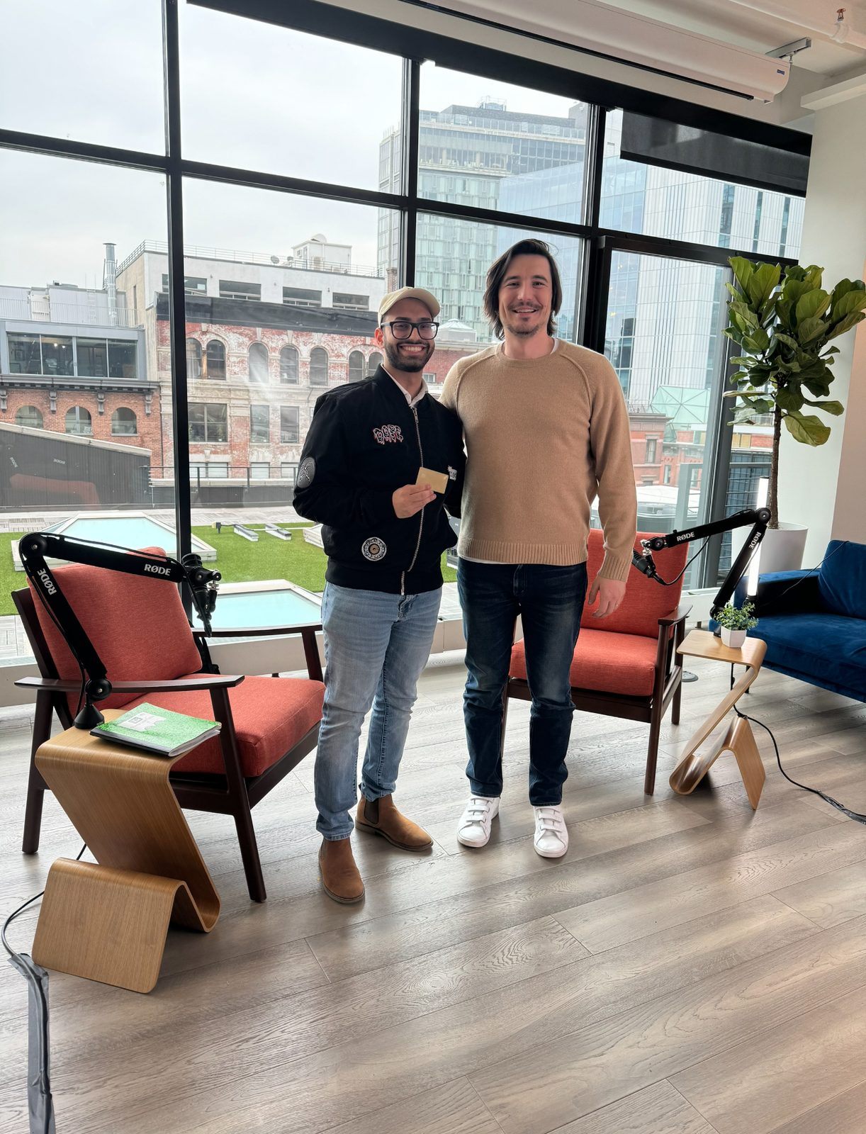 Amit with Vlad Tenev holding the Robinhood Gold card